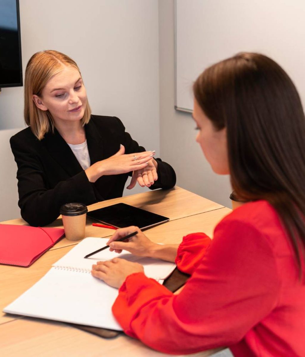 businesswomen-using-sign-language-communicate (1)